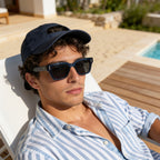 REEF Tide sunglasses on face lifestyle